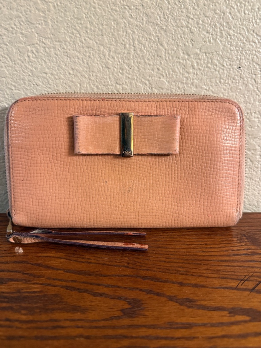 Chloe Peach Bow Zip Wallet with Gold Accent needs TLC